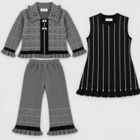 Girls’ Grey and Black Knitted 3 Piece Winter Outfit with Plaid Jacket, Tunic and Pants photo 2