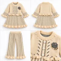 Girls’ Cream Knitted 2 Piece Winter Outfit with Black Stripes, Pearl Details and Pants photo 2